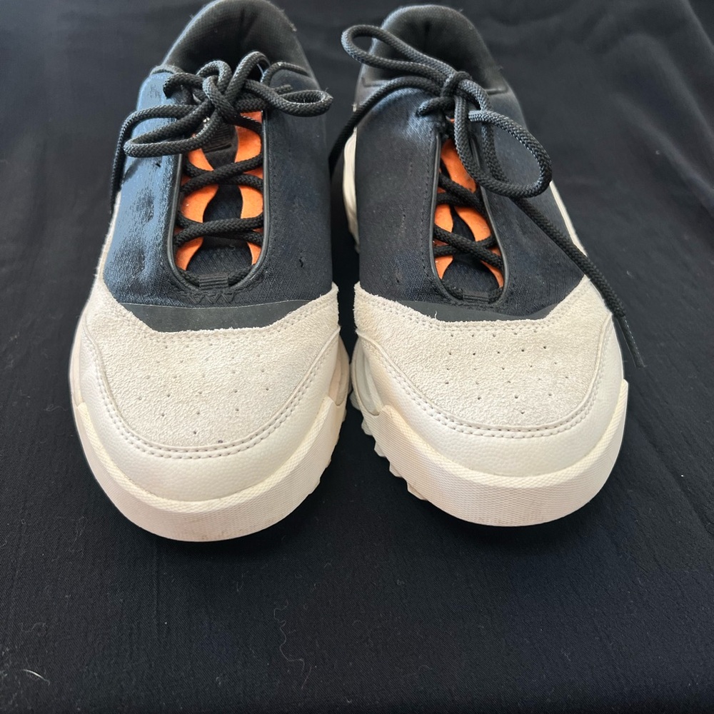 Sorel Women's‎ Black and Cream Sneakers with Orange Accents